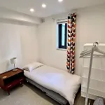 60s-style Coastal Retreat Minutes From The